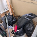 Bags of rubble and lose bits Few bags of rubble lengths of timber and sheets of cardboard and old metal rack. N16 - removed for £104