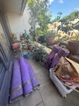 Dispose of carpet and underlay Living room carpet rolled and secured N19 - removed for £94