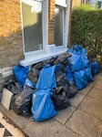 Bathroom refurb waste Around 50 rubble sacks containing waste from bathroom rip out, mainly tiles. Piled up in front garden with access to road N8 - removed for £194