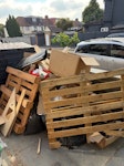 Garden rubbish. This is garden stuff. Not heavy. Most of the stuff are empty card boxes under the pallets. To come as soon as possible E10 - removed for £141