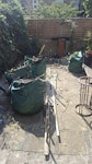 4 bags of garden waste 4 bags of garden waste and some pieces of wood as shown in the photo E5 - removed for £94