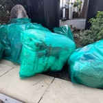 10 bags of rubbish 10 bags of rubbish in the front garden W11 - removed for £71