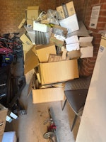 Cardboard boxes to be removed collected by Ram it in skip hire