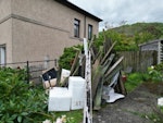 Wooden panels, seats, plastic Some wooden panels, mini fridge, small tv, water butt, plastic, polystyrene, slabs, bar stools, hose, baby rocker KY12 - removed for £175