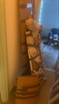 cardboard shelves plastic box Cardboard, wooden shelvws, plastic box and broken plastic stool N5 - removed for £52