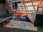 2x junk piles, inc shed panels Old shed panels, wooden gate post, branches, rubbish bags, pallet (not the wheelie bins in the photos, they are there to show scale) HA1 - removed for £235