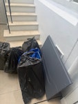 a boot screen & 10 bags of rub 10 bags of Rubbish on a small screen from the boot of a car W11 - removed for £71