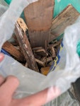 7 bags of waste Wood + foliage 7 rubbish bags in total: 3 green sacks filled with garden waste (ivy), 3 clear sacks filled with garden waster (ivy). 1 builders clear bag filled with rotten wood. W3 - removed for £50