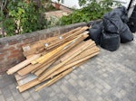 7x sacks carpet & wood pile 7 rubble sacks of carpet, foam underlay and small amount of carpet gripper. Small wood pile, mix of mdf, hardboard and plywood. SE23 - removed for £123