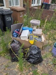 assorted household waste old cat tree+ litter box, couple of bin bags, a few other bits. SW20 - removed for £83