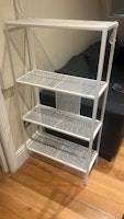 1 tall table and 1 shelving collected by Squeaky Clean Removals