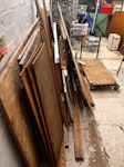 Wood boards and bits Wood boards, flattened wooden cupboard, lots of offcuts of wood that could be reused. Also a trolly AL1 - removed for £156