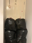 Bagof clothes no builder waste 6 tied black bin bags containing old clothing and textiles only. No heavy waste, food, or sharp objects. All bags will be placed directly at the front door/entrance ready for a quick, single-person pickup. CR8 - removed for £50