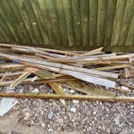 Garden rubbish - 3 ikea pax wooden flat pack
- the remaining pieces of wood (in the picture)
- 2 broken tables
- the broken green garden front fence SM5 - removed for £104