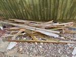 Garden rubbish - 3 ikea pax wooden flat pack
- ⁠the remaining pieces of wood (in the picture)
- ⁠2 broken tables 
- ⁠the broken green garden front fence SM5 - removed for £104