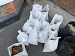 Bags Rubble and Garden waste 13 half bags of gravel and 3 bags of garden waste RG1 - removed for £77