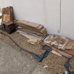 Laminate boards, palettes, etc Stack of laminate flooring and some underlay. Stack of plastic patio tiles. 3-4 old palettes. Rolled up rugs, curtain poles, pieces of tarp.
It's currently in the back garden, but we will stack in front of the house for collection. SE6 - removed for £104