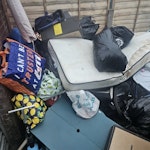 rubble and waste 1 small mattress aprox 10-12 blue waste sacks containing soil 10 general waste bags and basket ball stand BL3 - removed for £117