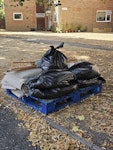 Carpet, Underlay and Pallet Small amount of carpet and underlay from one room, underlay is in black bags, theres one black bag of general rubbish. gripper rod is wrapped up in underlay. the blue euro pallet is to be taken too please. RH6 - removed for £57