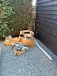 Wooden pallets and other waste Wooden pallets, boxes, railing, and other solar installation waste CM11 - removed for £141
