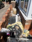 Rubbish including radiator Rubbish in small front area between wall and front of house. Includes a radiator. GU1 - removed for £141