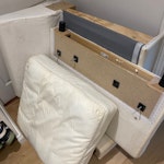 An armchair & A small table An armchair broken into 3 parts and a small table W4 - removed for £71