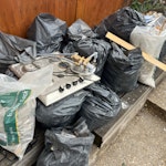 rubble bags, rads, doors rubble bags, timber, glass, doors, radiators 8, bathroom sink and vanity E5 - removed for £176
