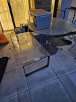 2x tables, microwave, bin I'd like a quote for removing and disposing of two old tables, a microwave and a built-in garbage bin (removed now) from my flat at N1 7GT.

One is a large round glass pedestal table, shown in the attached photo. The glass top may lift off, but the base might need dismantling. The other is a rectangular glass coffee table. N1 - removed for £130