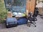 boxes of packaging, old items 3 boxes of rubbish, mostly packaging. 3 old suitcases. 1 old office chair N8 - removed for £104