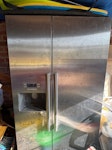 American style fridge freezer Height 180cm, width 90cm, depth 70cm. Currently in garage which opens directly onto driveway. RG27 - removed for £174