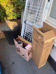 Empty bin, hoover, box, rack Black bin (empty), hoover in box, cat pole in box, drying rack. TW11 - removed for £41