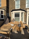 mostly cardboard a lot of cardboard from our renovation and couple of wooden pallets. too big for our bins and no car to take to the tip. SE4 - removed for £130