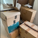 Multiple large and mid boxes About 15-20 boxes from furniture and household goods delivery. Varying sizes, mostly empty, some have packing/household waste (wrapping paper, hangers, cardboard). Some boxes may be reusable. SW3 - removed for £104