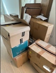 Multiple large and mid boxes About 15-20 boxes from furniture and household goods delivery. Varying sizes, mostly empty, some have packing/household waste (wrapping paper, hangers, cardboard). Some boxes may be reusable. SW3 - removed for £104