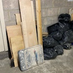 Bathroom renovation waste Bathroom refurbishment waste from two bathrooms. Mainly broken ceramic tiles, tile adhesive/grout, plywood and timber offcuts, damaged wooden flooring/subfloor, and bagged general building debris. No hazardous waste. EC3N - removed for £104
