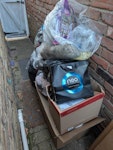 old clothing + child's cupboar Bags/box of old clothing. Dismantled small 5 ft cupboard and some mdf boards. IG7 - removed for £83