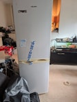 white goods and two sofas. small fridge, washing machine, dryer, slimline dishwasher and two couches. there are a few bags of general household waste as well. SL2 - removed for £260
