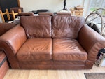 Leather 2 seater sofa 15 year old leather sofa. 
185cm x 97cm x 80cm. 
Currently in conservatory so easiest access through side gate, to back of house, double doors for easy removal of sofa. 
Easy parking on driveway. BN24 - removed for £97