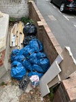 Bags of rubble + timber 2 large heavy black bags containing solidified plaster; approx 13 smaller blue bags rubble; offcuts of timber; some pvc window trim; some small offcuts of plasterboard; 1 bag solidified tile adhesive; some small bits of scrap iron. E15 - removed for £125