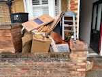 Wooden desk and moving boxes Broken wooden desk, card moving boxes and general moving junk TW11 - removed for £141