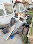 building waste need the front garden waste all
collected. Everything except bins. E7 - removed for £286