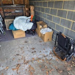 Boxes, car seat, pram, duvet Baby's car seat. Pram. Duvet. Three cardboard boxes filled with rubbish (mainly old clothes). Some potentially reusable. DA16 - removed for £52