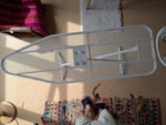 Ironing board and cover Metal ironing board with lattice top and resting place for iron. Two height settings. 

Worn and used flamingo cover (optional as can be disposed of elsewhere) SE13 - removed for £26