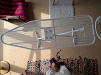 Ironing board and cover collected by Ican Services