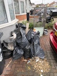 Ceiling replacement and cage Several bags of rubble from a ceiling replacement, slats of wood outside bags, a cage, and a couple of miscellaneous items. IG6 - removed for £214