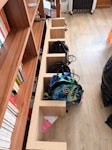 Various boxes and bookcase A number of large cardboard boxes, a long bookcase and two black sacks filled with junk SK11 - removed for £130