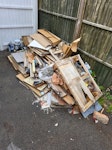 Kitchen ripout and rubbish Cupboards from kitchen ripout. Some heavy tiles from the floor. General builders rubble. Cardboard. Some pipes. Mixed junk. Wooden boards. KT16 - removed for £243