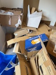 Cardboard, bin bags, bookcase A sizeable amount of cardboard boxes from house move, some intact, some broken down; 3-4 black bin bags of rubbish; 1 wooden bookcase (shelves removed to make carrying easier). All deposited in front garden for easy access. NW2 - removed for £104