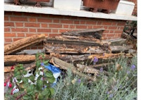 Rotting wood garden sleepers collected by Advance Waste