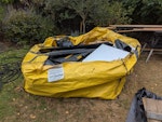 Bag of mixed waste (no rubble) Mixed waste from a garden room build.  Mostly light rubbish bags, some hard plastic, empty cans, insulation off cuts, plasterboard, timber off cuts, plastic work bench.  Leave the hippo bag NW2 - removed for £176